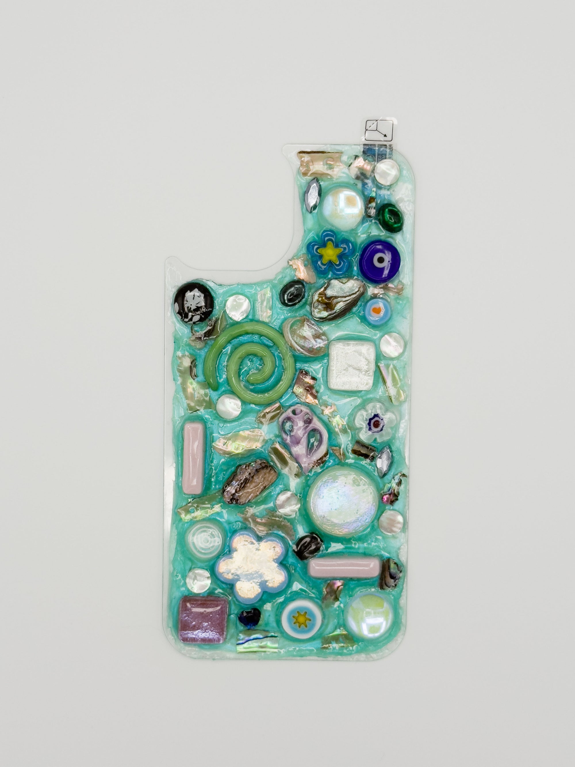 "Peel 'n' Stick" Phone Backers